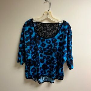 Vibrant Blue Leopard Print Blouse with Lace Detail